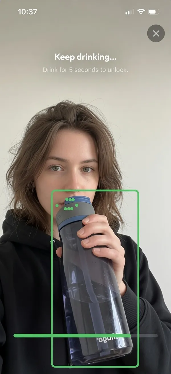 The camera checking someone drink from a bottle